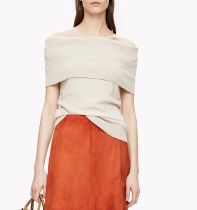 For reasons I cannot fully articulate, I believe that this would be charming with a crisp white blouse underneath